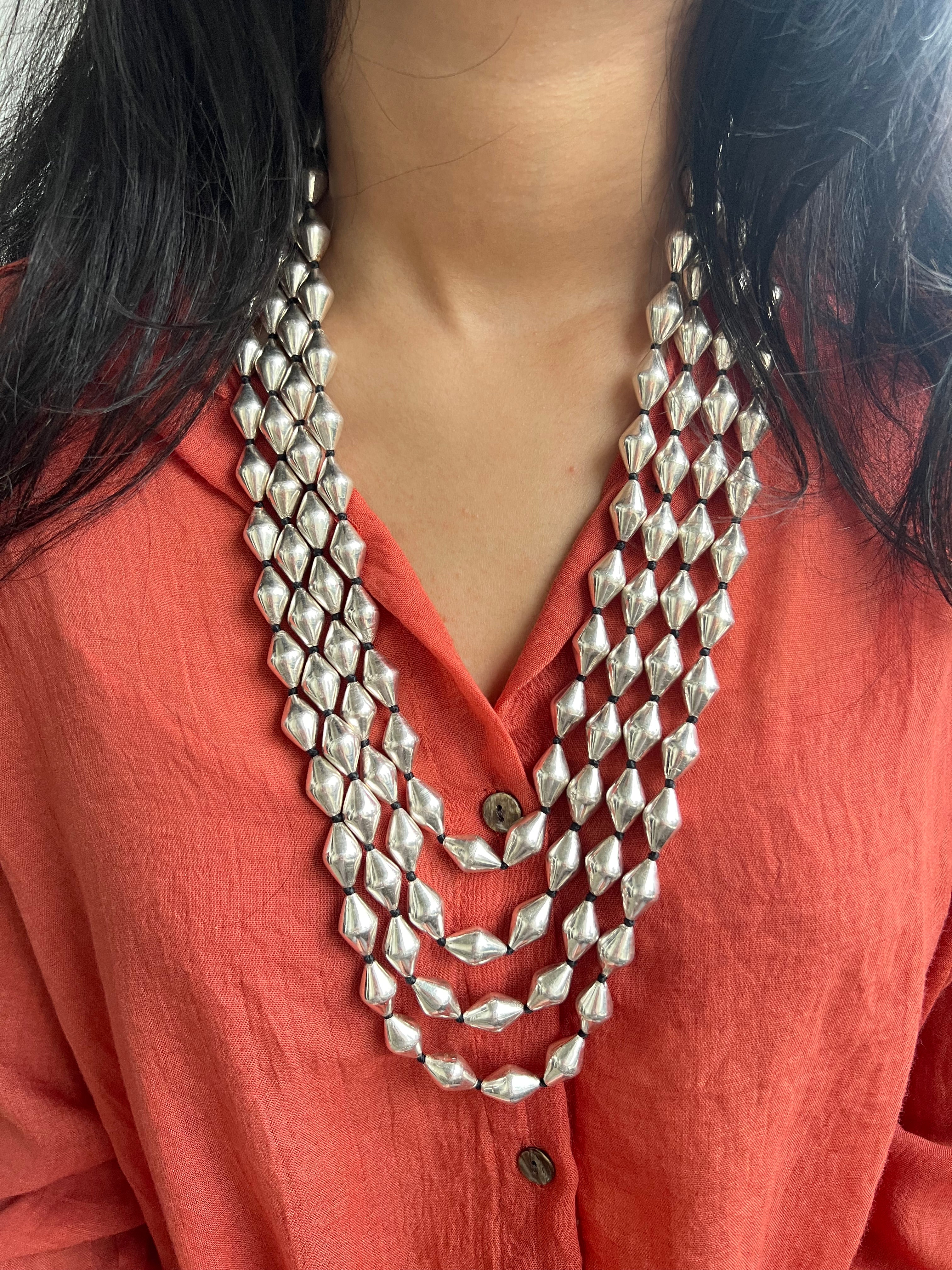 Lustrous Cascade Necklace with Dholki Beads