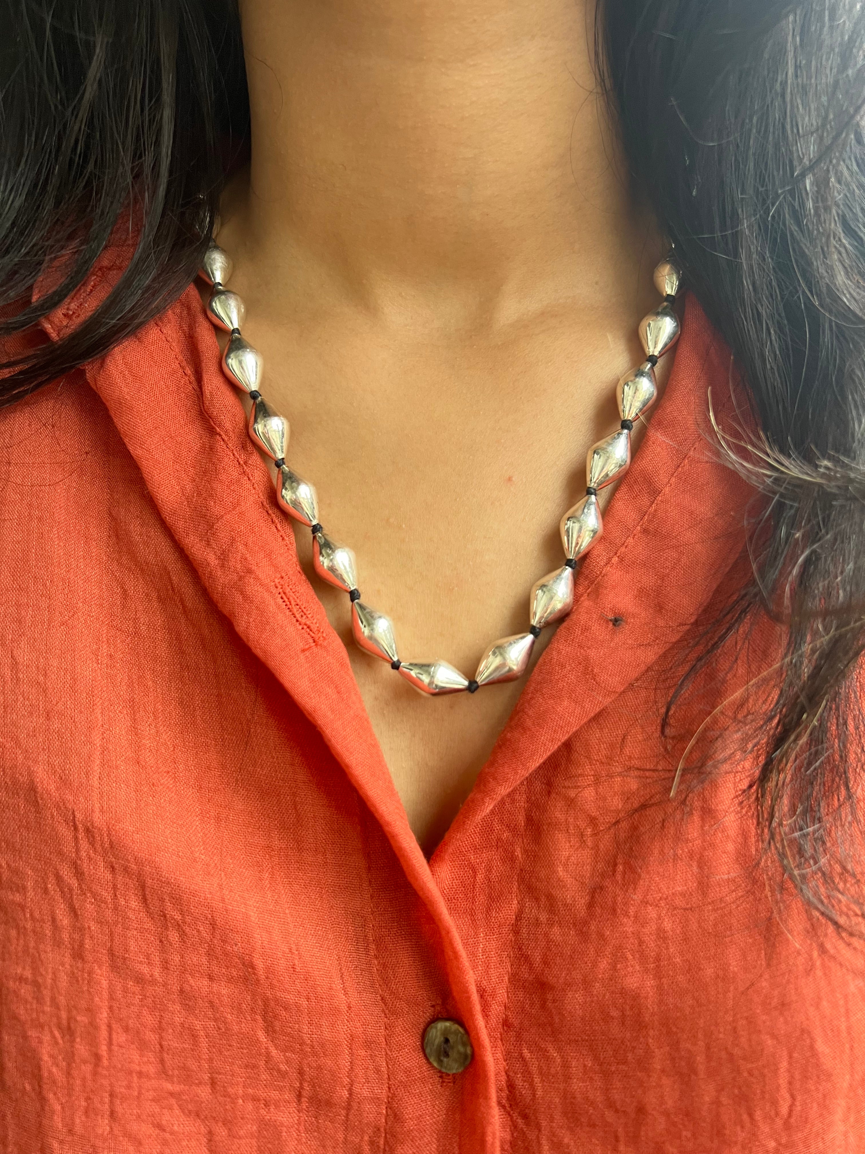 Whispering Lace Necklace with Ethnic Dholki Beads